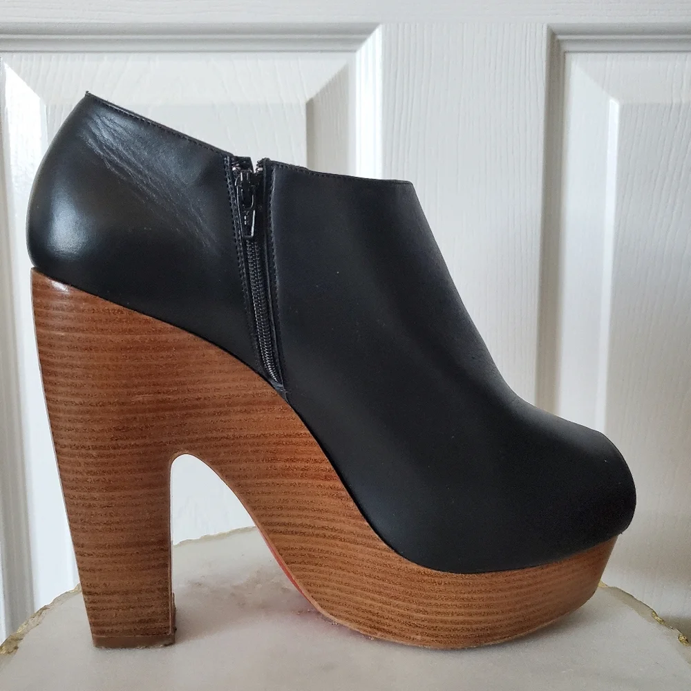 Christian Louboutin Black Leather Platforms